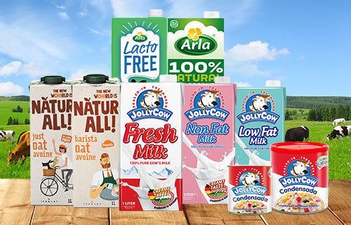 Display of various dairy and plant base milk under the Arla, Jolly Cow and Natur All brand.