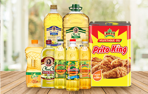 Product shot of various cooking oils in can and bottles under the Dona Elena Claro, Heartmate, Jolly and Prito King